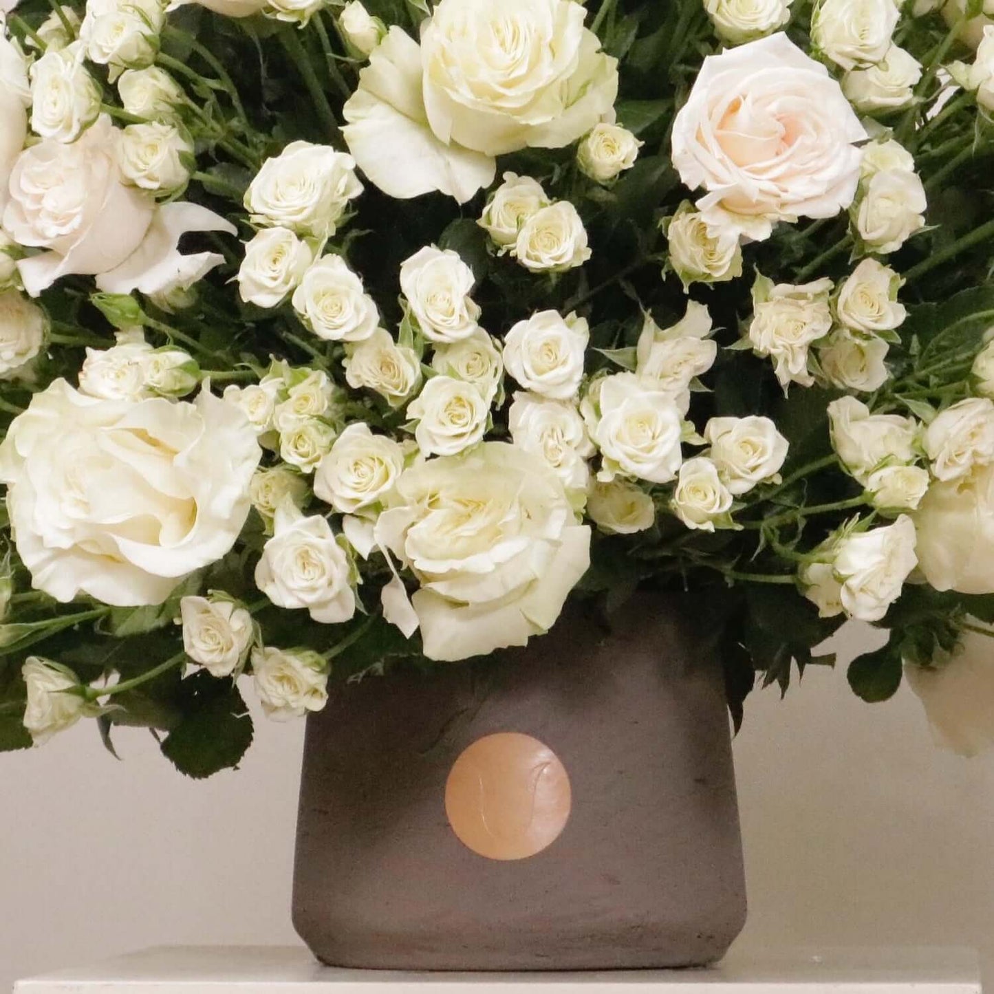 Luxurious Gardenia IV bouquet with elegant white roses in a Victorian-inspired arrangement, radiating timeless elegance and joy.