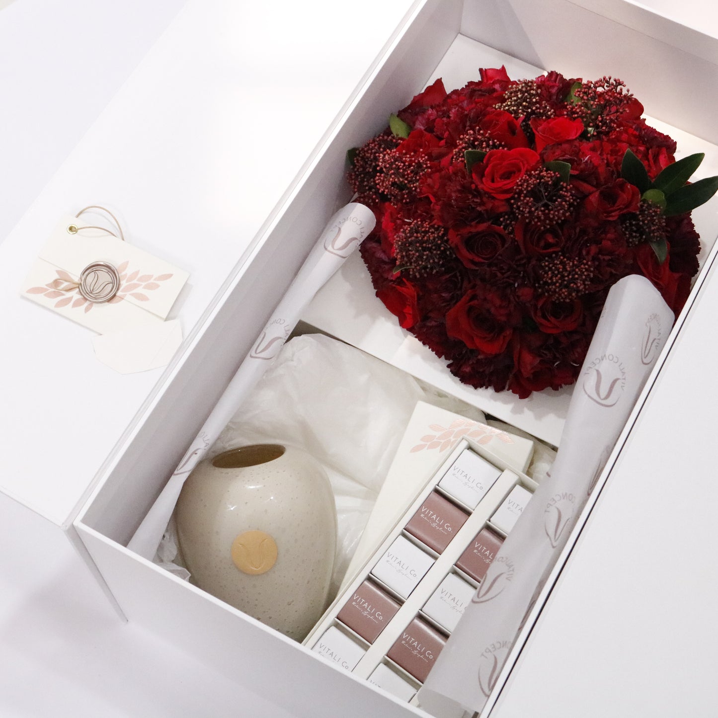 Story in a Box luxury floral gift box premium handcrafted blooms elegant storytelling gifting Kuwait Vitali Concept
