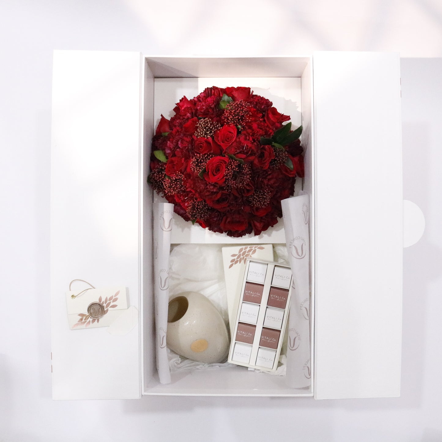 Story in a Box luxury floral gift box premium handcrafted blooms elegant storytelling gifting Kuwait Vitali Concept