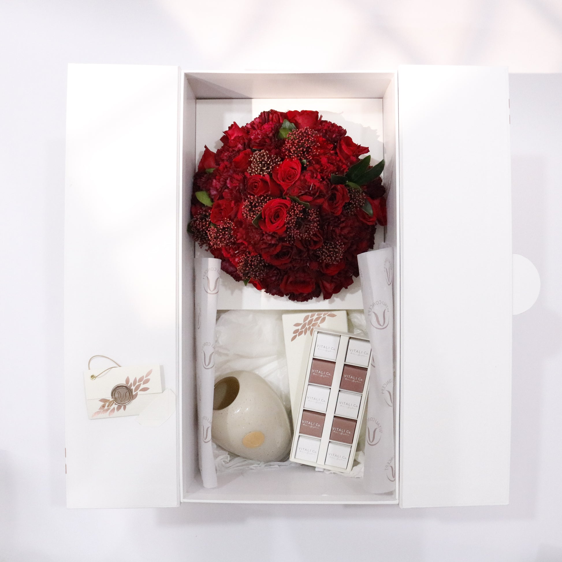 Story in a Box luxury floral gift box premium handcrafted blooms elegant storytelling gifting Kuwait Vitali Concept