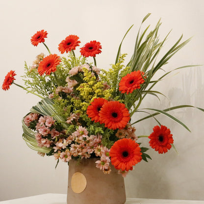 ORÉ luxury floral arrangement premium handcrafted golden toned blooms elegant statement gifting Kuwait Vitali Concept