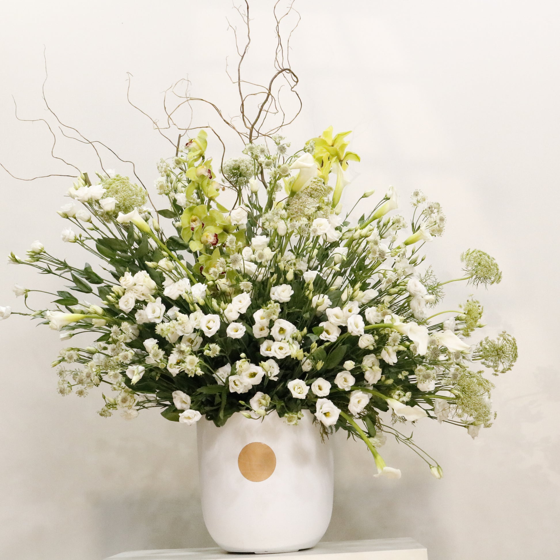 La Majesté II luxury floral arrangement green cymbidium orchids white lisianthus calla lilies queen anne's lace Kuwait Vitali Concept