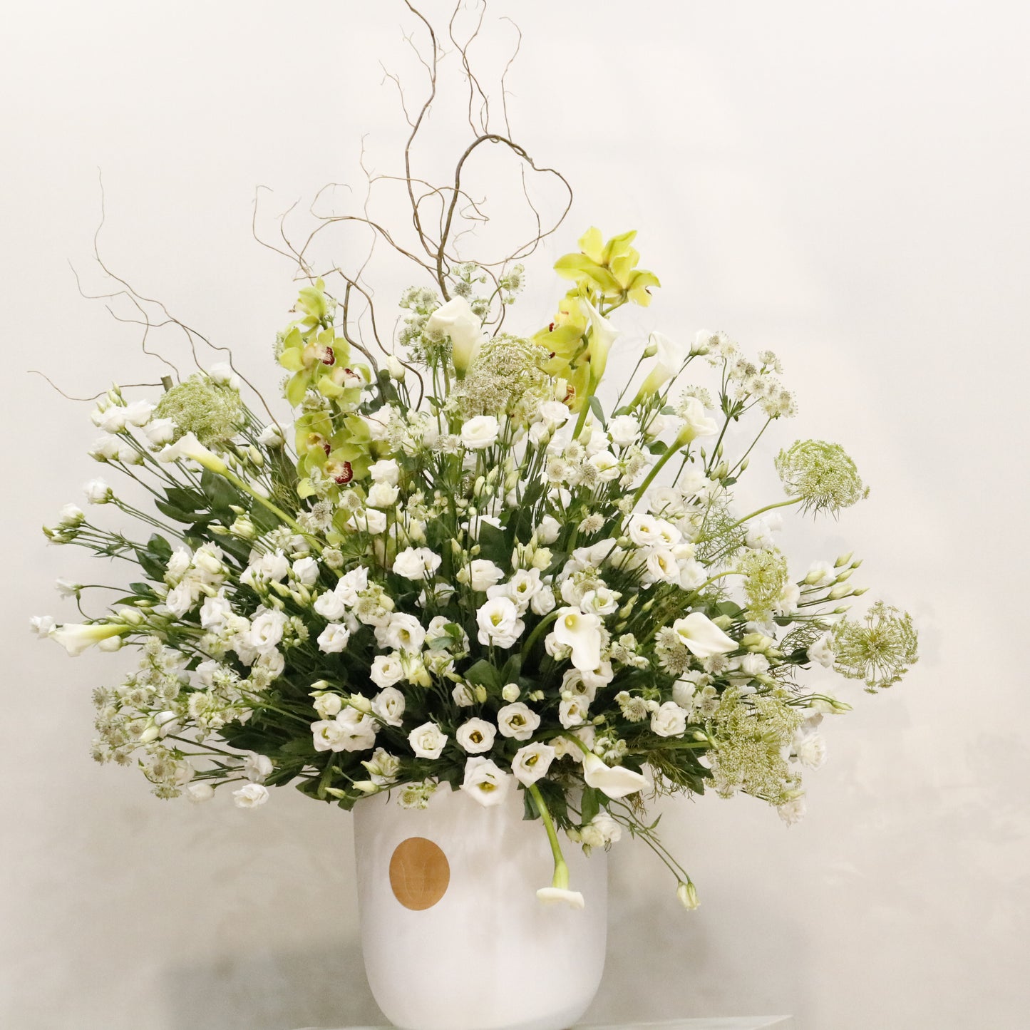 La Majesté II luxury floral arrangement green cymbidium orchids white lisianthus calla lilies queen anne's lace Kuwait Vitali Concept