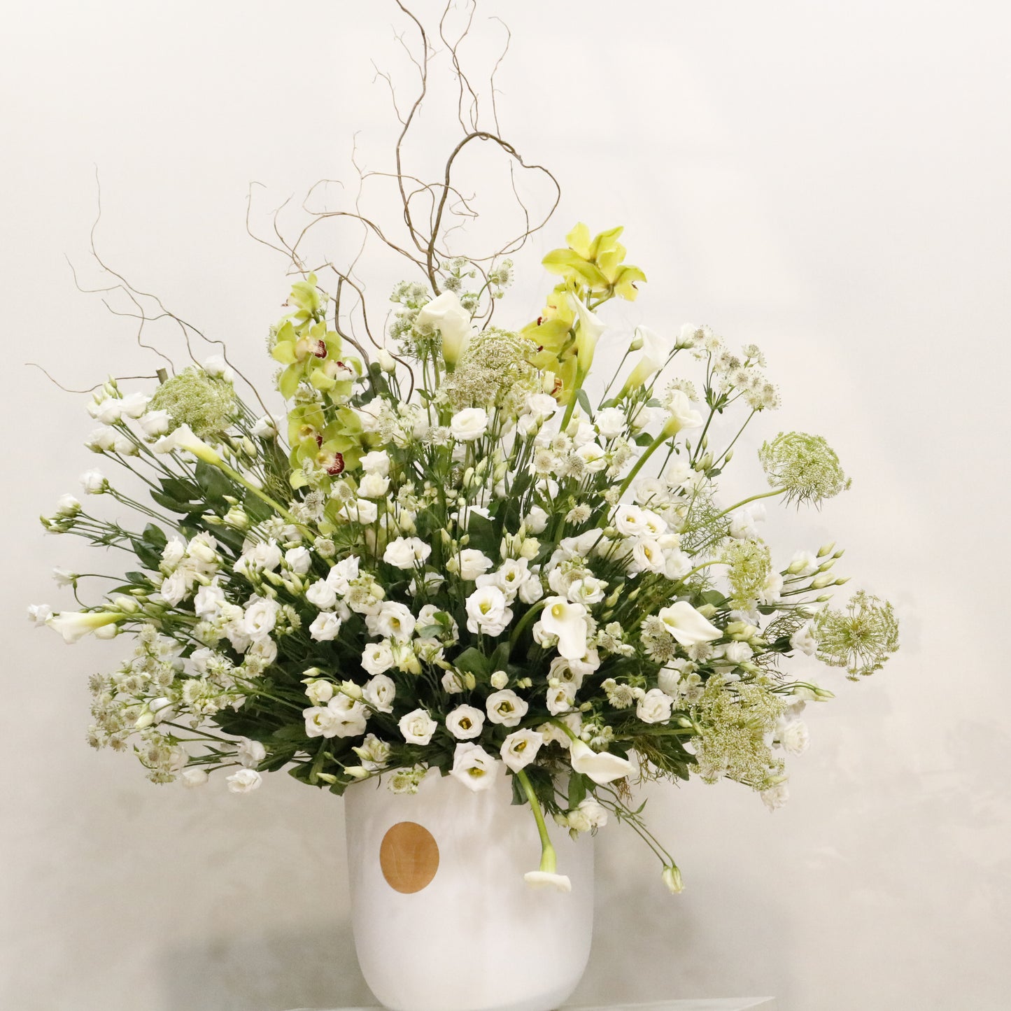 La Majesté II luxury floral arrangement green cymbidium orchids white lisianthus calla lilies queen anne's lace Kuwait Vitali Concept