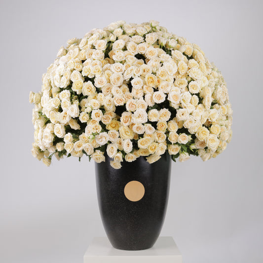 The Ivory Cascade luxury floral arrangement premium handcrafted white ivory cascading blooms elegant grand interiors Kuwait Vitali Concept