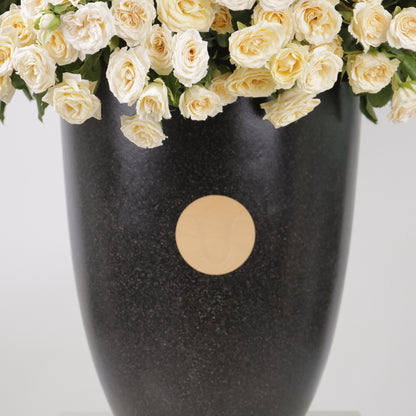 The Ivory Cascade luxury floral arrangement premium handcrafted white ivory cascading blooms elegant grand interiors Kuwait Vitali Concept