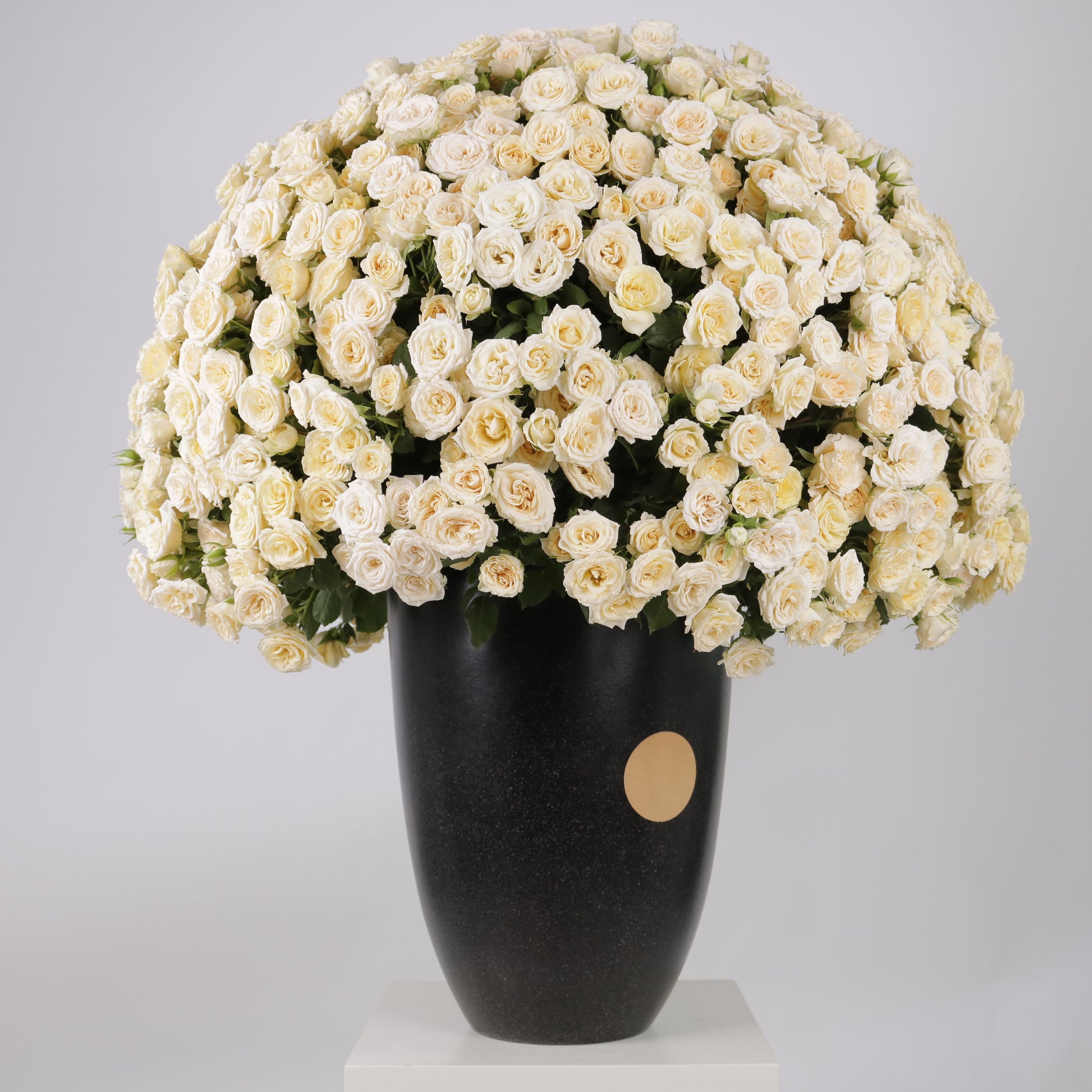 The Ivory Cascade luxury floral arrangement premium handcrafted white ivory cascading blooms elegant grand interiors Kuwait Vitali Concept