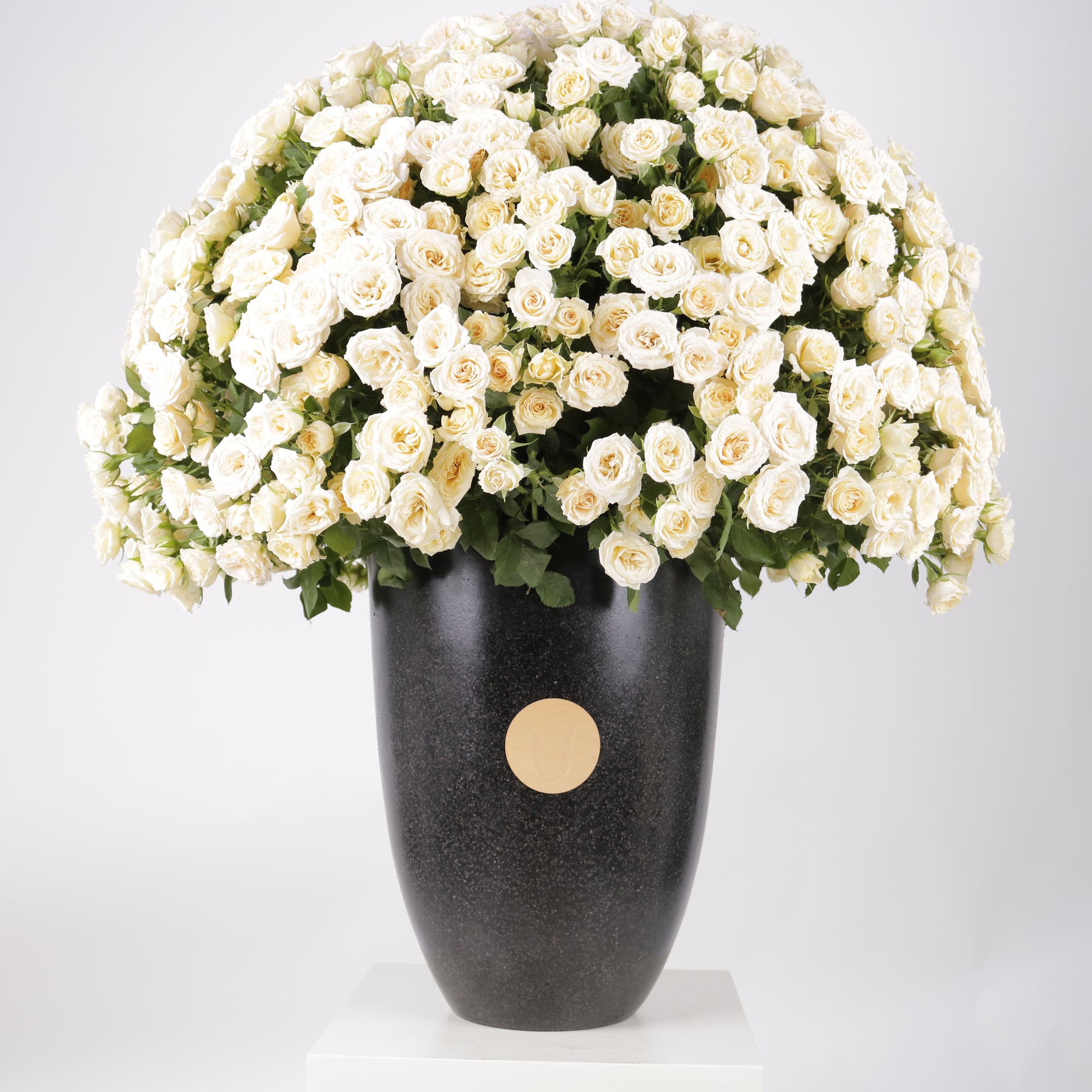 The Ivory Cascade luxury floral arrangement premium handcrafted white ivory cascading blooms elegant grand interiors Kuwait Vitali Concept
