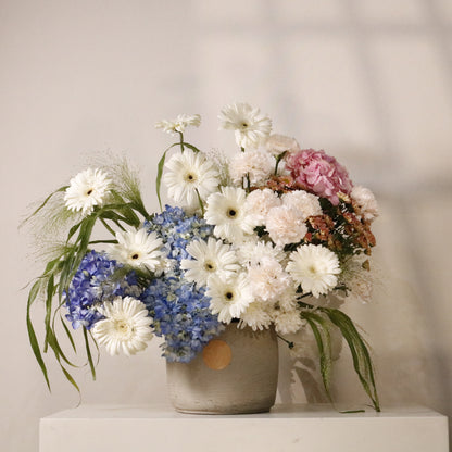 Celeste luxury floral arrangement blue hydrangeas white gerberas blush carnations pink hydrangeas Kuwait Vitali Concept