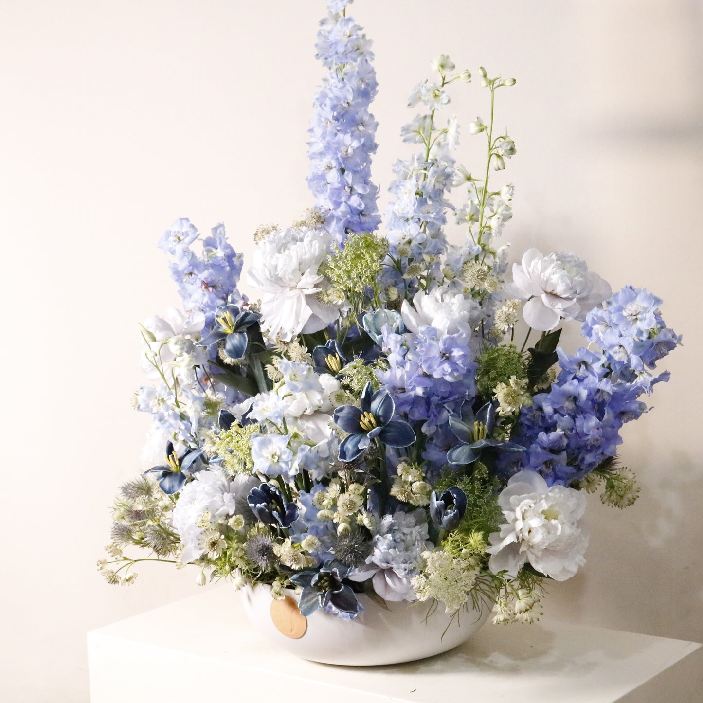Neptune luxury floral arrangement navy tulips blue delphinium white peonies Kuwait Vitali Concept