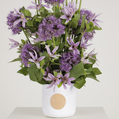 Viola luxury floral arrangement purple allium spheres clematis blooms Kuwait Vitali Concept