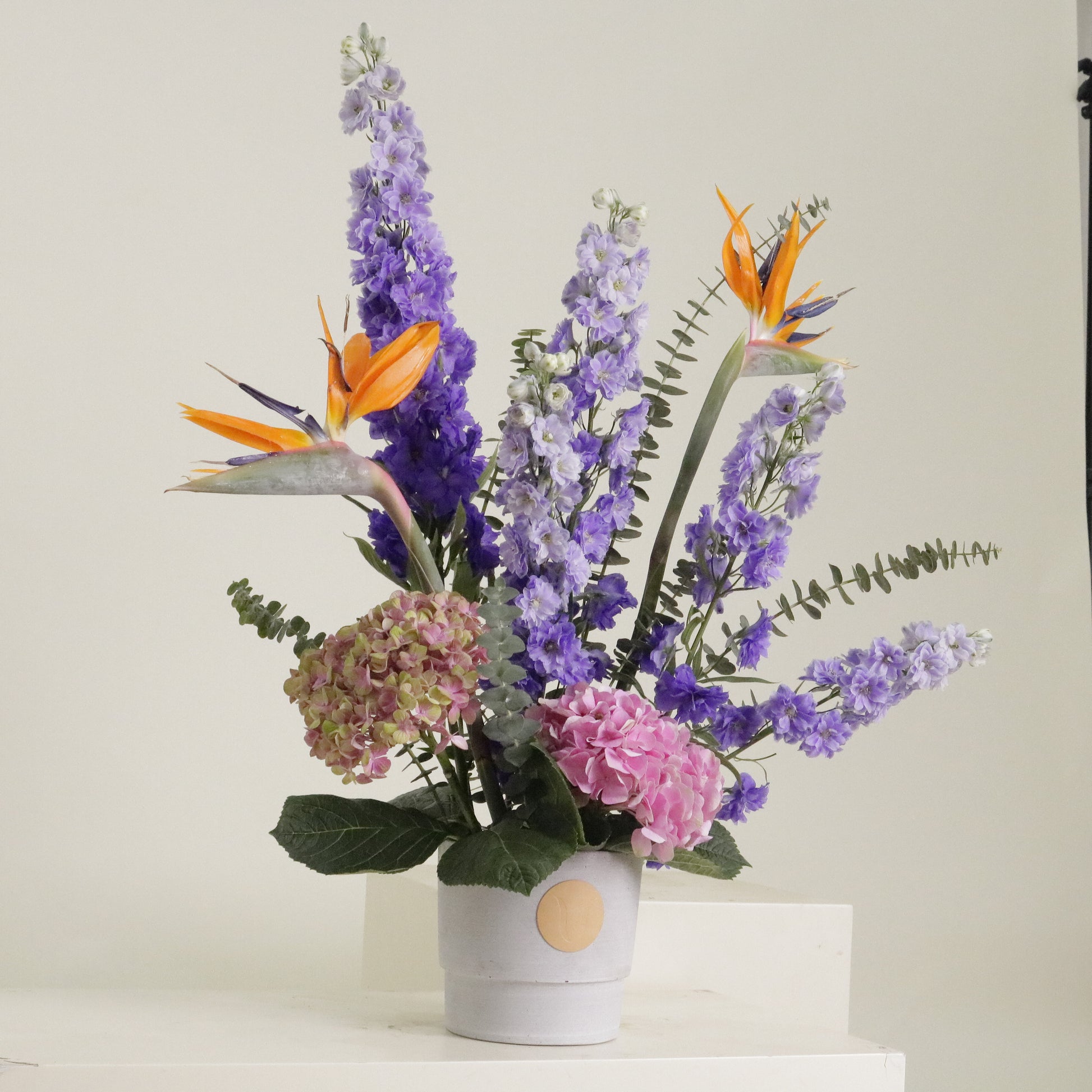 Paradis luxury tropical floral arrangement bird of paradise purple delphinium pink hydrangeas Kuwait Vitali Concept