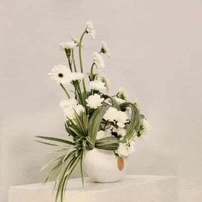 Ondas luxury floral arrangement premium handcrafted wave inspired blooms elegant modern interiors Kuwait Vitali Concept