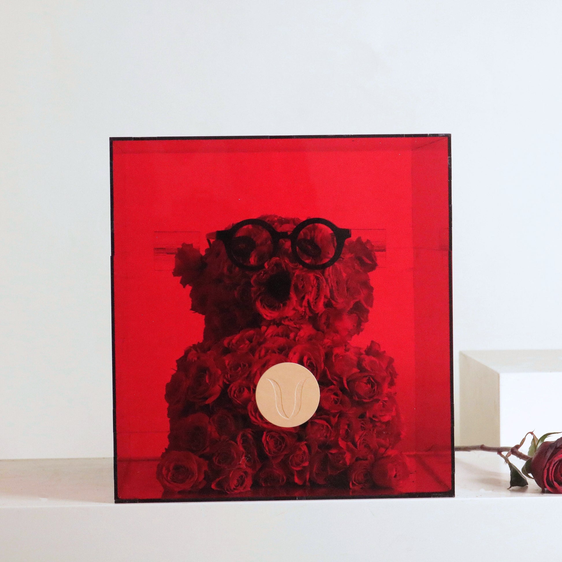 Hugs In A Box: Over 90 delicate rose stems elegantly arranged, symbolizing enduring love. Box dimensions: 40 CM height, 30 CM width.