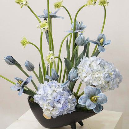 Ver III floral arrangement with hand-painted tulips, blue hydrangeas, and Ornithogalum, showcasing artistic modern elegance.