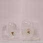 Elegant Dandelion-inspired sculptures by Style Jieum, showcasing timeless beauty and minimalistic design in glass domes.