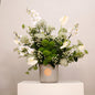 Elegant green and white flower arrangement in a decorative vase, featuring a mix of green flowers and white flowers, 110 CM height, 90 CM width.