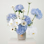 Bliss luxury floral arrangement blue hydrangeas white orchids modern stone vessel grand interiors Kuwait Vitali Concept