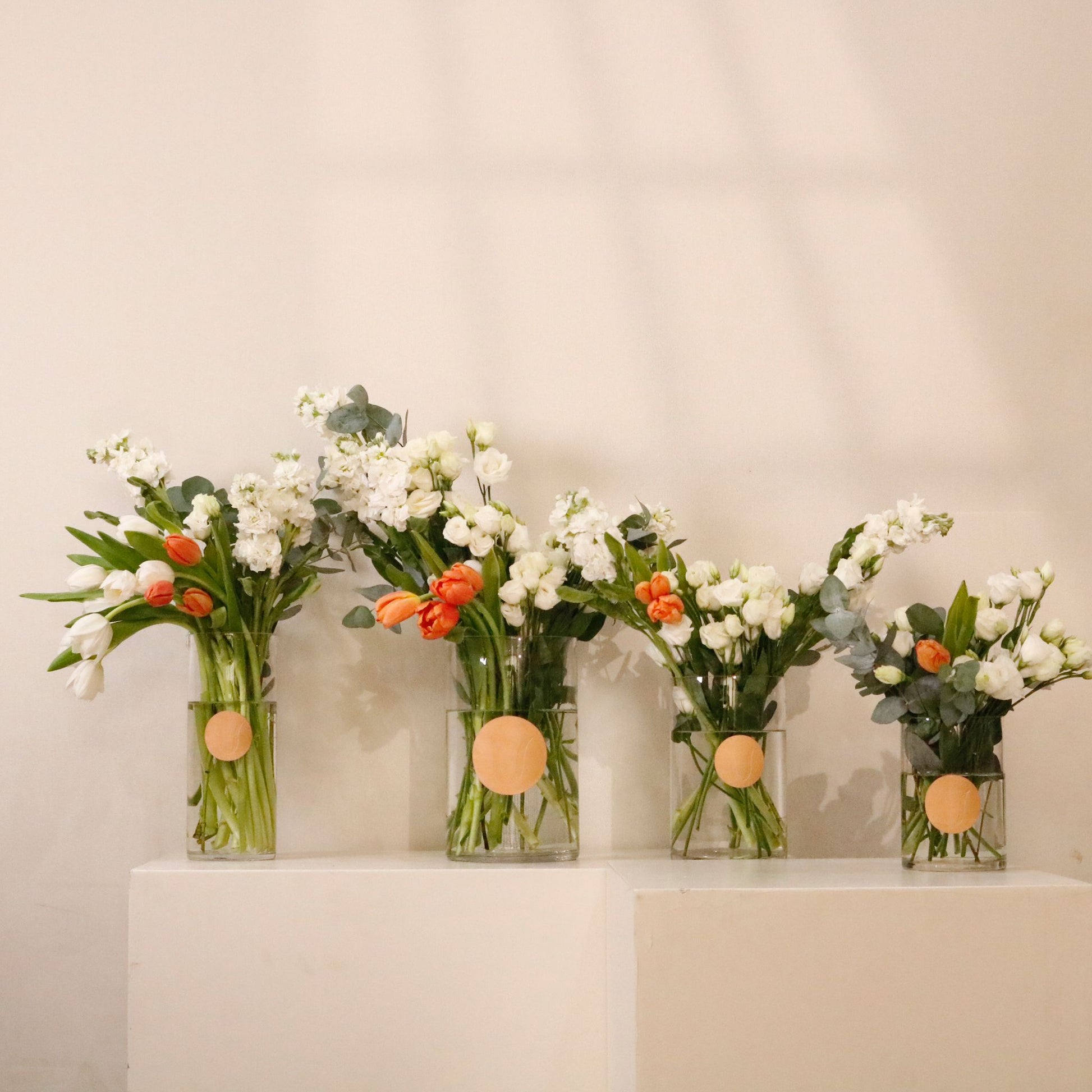 Aurora IX luxury floral collection set of 4 coral tulips white stock flowers eucalyptus Kuwait Vitali Concept