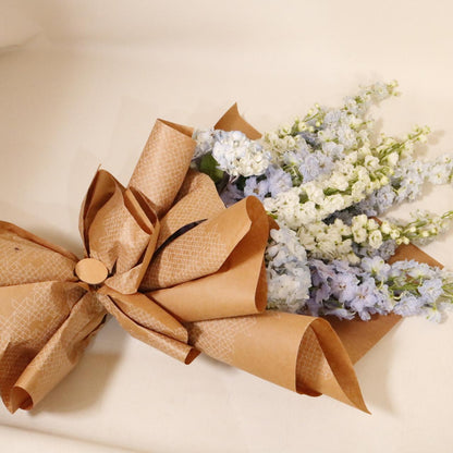 Azure Sky Bouquet luxury floral arrangement blue hydrangeas white orchids premium handcrafted gifting Kuwait Vitali Concep